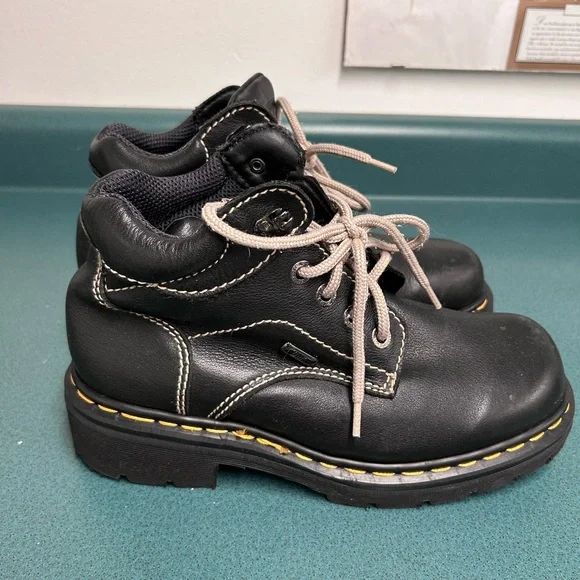 Dr. Martens Black and Tan Lace Up Boots - Picture 1 of 10